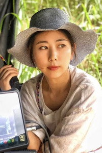 李华