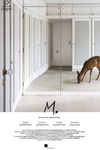 M.